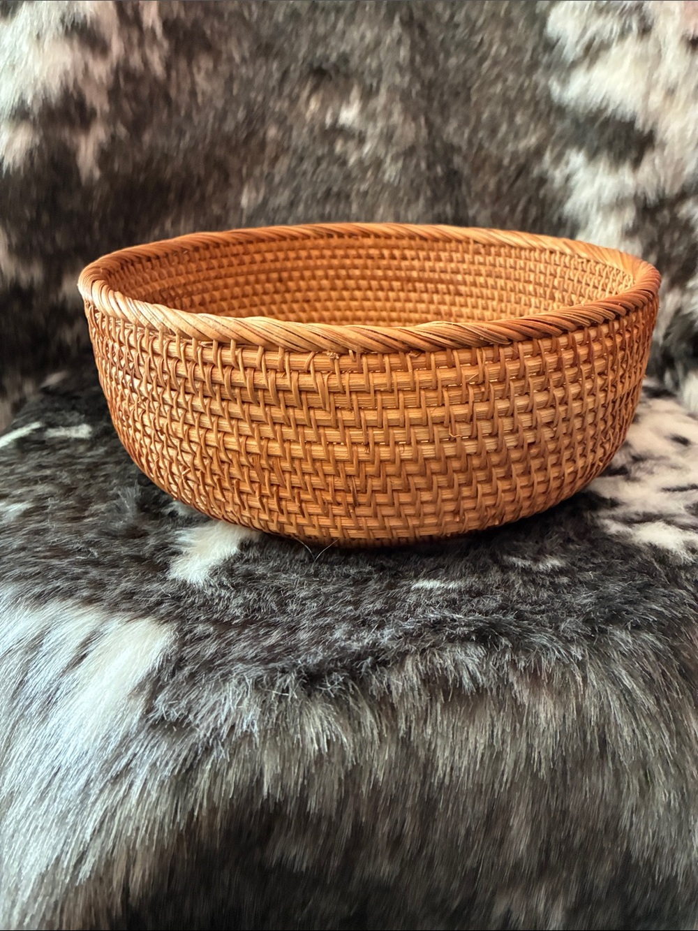 Hand-woven, round Rattan basket